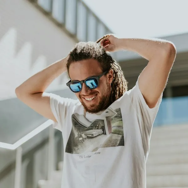 Relaxed visitor in light summer clothing