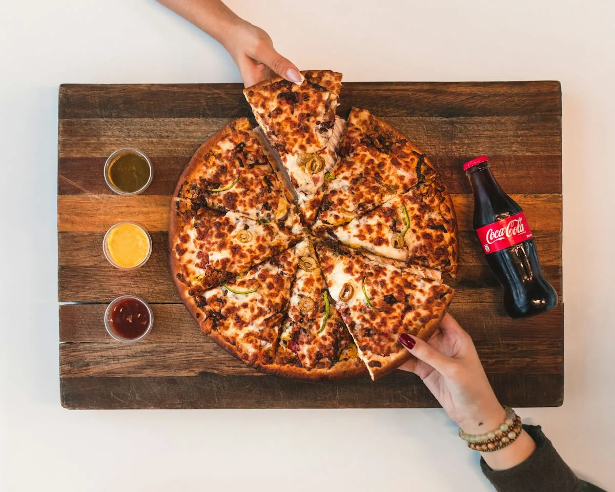 Fresh homemade pizza served on a wooden board